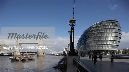 Tower Bridge, London, 1886 - 1894. Overall with City Hall in foreground. Architect: Horace Jones