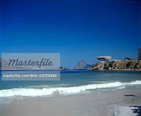 MAC, Niteroi, Rio de Janeiro, 1996. in context as a waterside development. Architect: Oscar Niemeyer