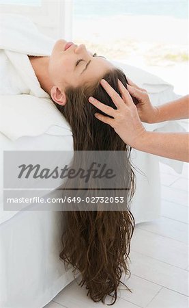 Female being given massage