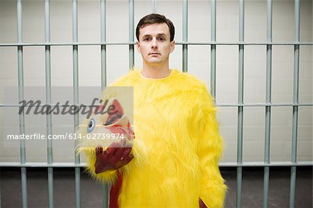 Prisoner in chicken suit