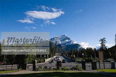 Road  and Snow-Coved Mountains at Banff in Canada