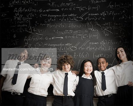 Students in front of blackboard