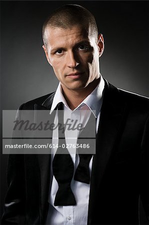 Portrait of a mid adult man wearing a dinner jacket Portrait of a mid adult man wearing a dinner jacket