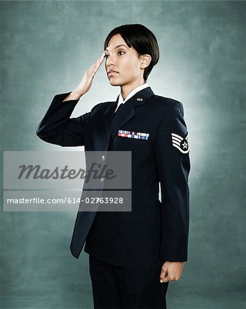 Portrait of an air woman saluting