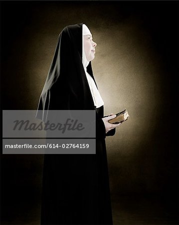 Profile of a nun praying