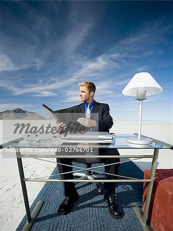 Businessman reading a file