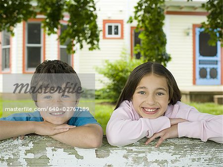 Portrait of a boy and a girl smiling