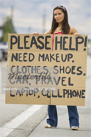 Woman standing on side of road soliciting