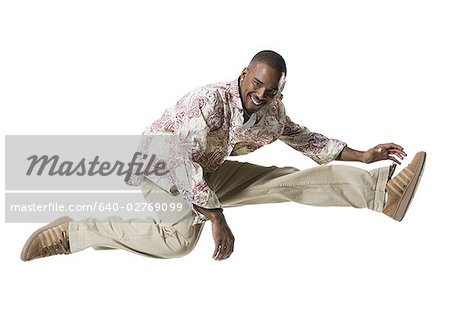 African American man jumping