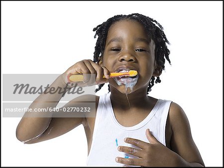 Boy brushing his teeth