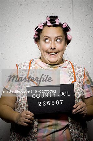 Mug shot of housewife with curlers