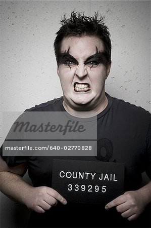 Mug shot of gothic man