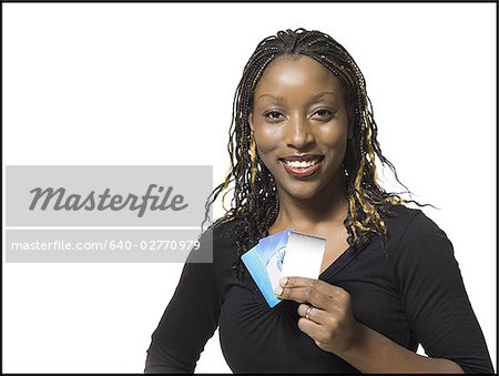 Woman holding bank cards smiling