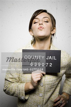 Mug shot de femme vêtue formellement