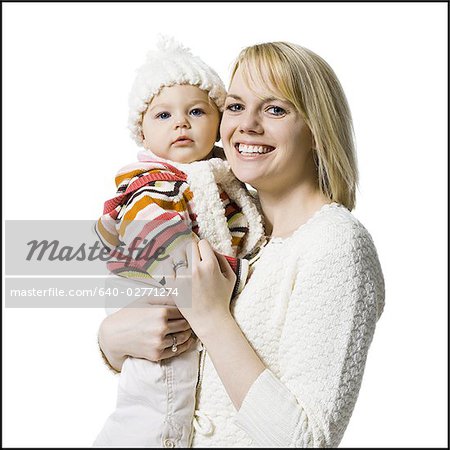 Woman holding baby girl