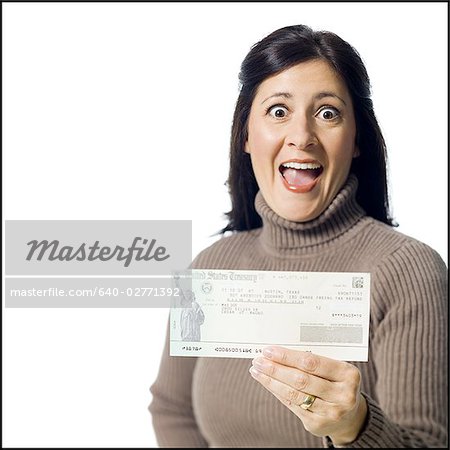 Woman holding cheque from US Treasury