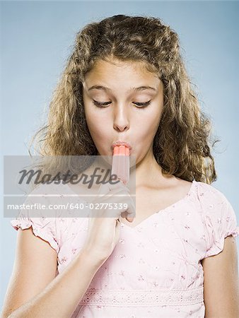 Girl eating Popsicle