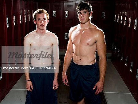 Two High School students in a locker room.