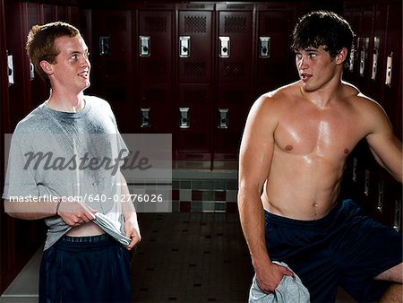 Two High School students in a locker room.