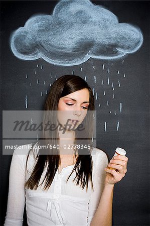 young woman against a chalkboard