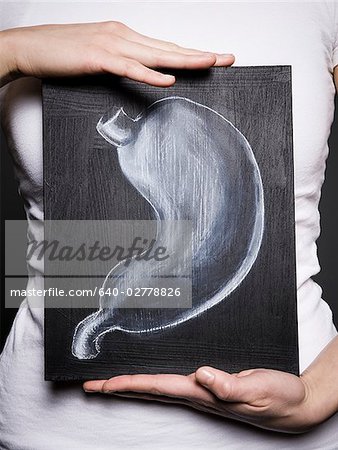 Woman with a drawing of a stomach