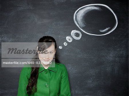 woman in front of a chalkboard