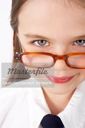 Girl Looking over Glasses