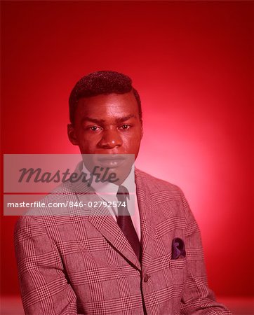 1960s PORTRAIT AFRICAN AMERICAN SERIOUS YOUNG ADULT MAN IN SUIT AND TIE