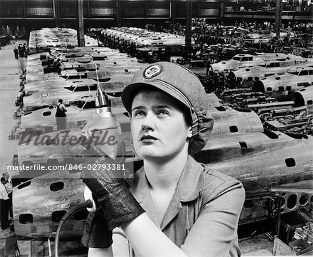 WOMAN ROSIE THE RIVETER SUPERIMPOSED OVER AIRPLANES IN FACTORY 1940s WARTIME WWII WORKER WORK