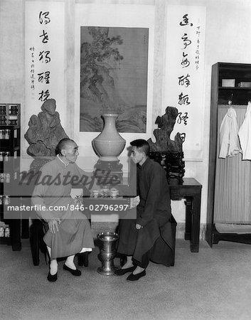 1920s 1930s TWO CHINESE MEN SAMPLING TEA IN HOUSE OF WANG TEA SHOP IN HANGCHOW CHINA