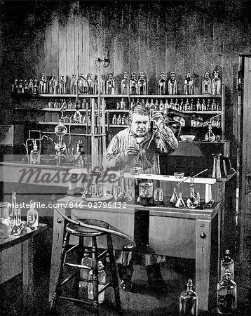 DRAWING GENIUS INVENTOR THOMAS A. EDISON AT WORK IN HIS LABORATORY IN MENLO PARK NEW JERSEY USA