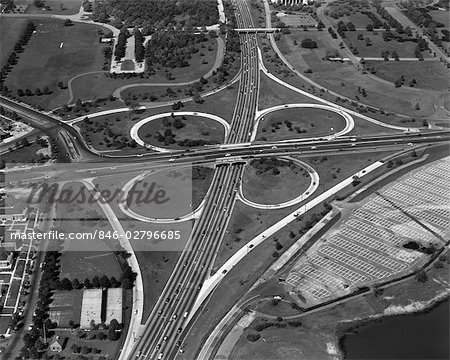 1950s 1960s AERIAL CLOVERLEAF HIGHWAY INTERSECTION GRAND CENTRAL PARKWAY FLUSHING MEADOW PARK QUEENS NEW YORK