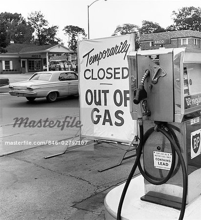 1970s TEMPORARILY CLOSED OUT OF GAS SIGN BY GAS STATION PUMP DURING GASOLINE SHORTAGE CRISIS OPEC OIL