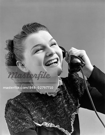 1940s WOMAN TALKING LAUGHING ON TELEPHONE