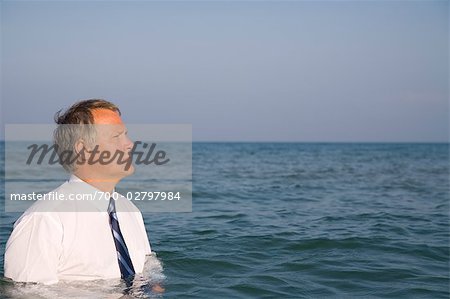 Businessman in the Ocean