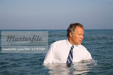 Businessman in the Ocean