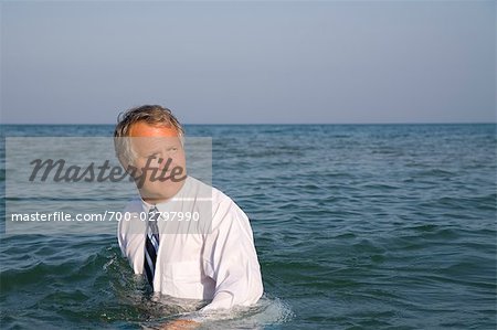 Businessman in the Ocean