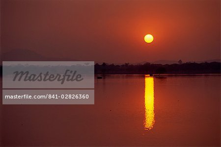 Sunset over lake created by dam, Deogarh, Rajasthan state, India, Asia