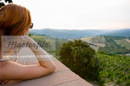 Woman Looking Out, Radda in Chianti, Province of Siena, Tuscany, Italy