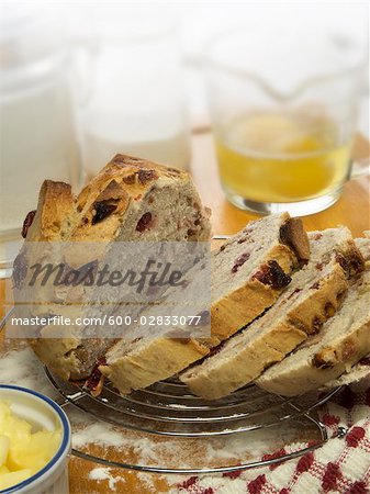 Cranberry Bread on Cooling Rack With Baking Ingredients