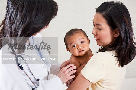 Doctor Examining Baby