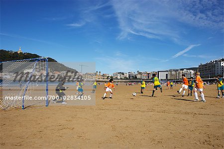 Youth Soccer Game on the Beach, San Sebastian, Basque Country, Spain