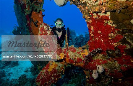 Diver on shipwreck.