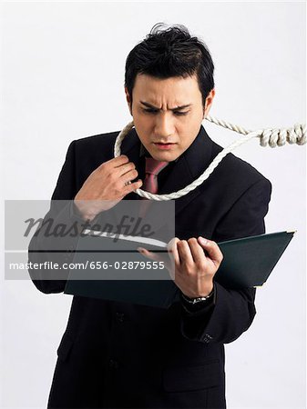 man holding work file with a rope around his neck