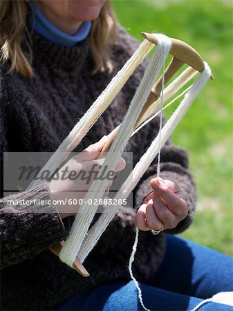 Woman Winding Wool onto Skein