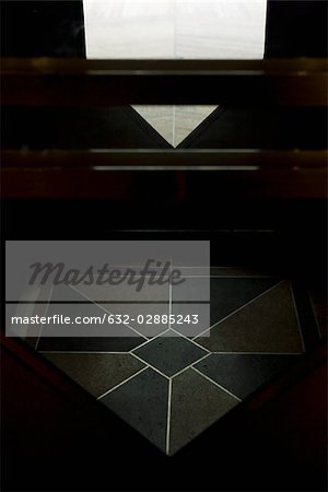Geometic pattern on tiled floor