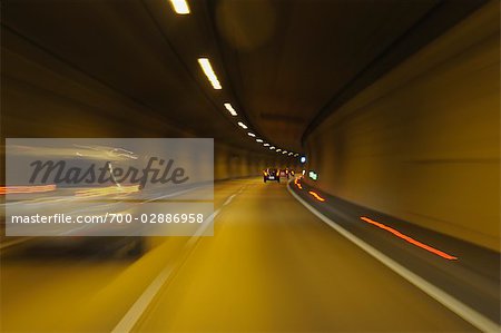 Cars Driving in Tunnel