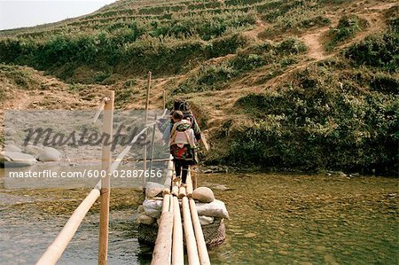 People Crossing Bridge near Sa Pa, Northern Vietnam