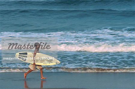 Boy surfing at North Beach, Indian Ocean, Durban, KwaZulu-Natal, South Africa, Africa