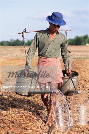 Farmer with watering cans, Cambodia, Indochina, Southeast Asia, Asia